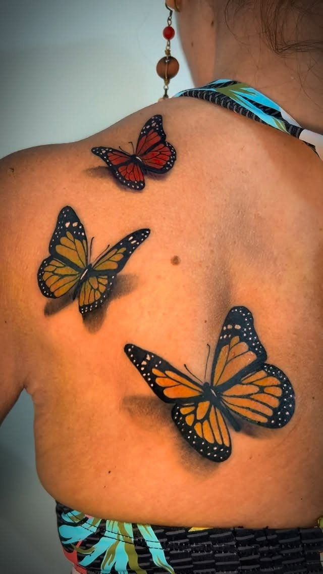 Butterfly tattoo artwork with crisp outlines and soft detail